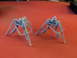 Side by Side comparison of old tripod (left) vs new tripod (right) for the new E-Web Heavy Repeating Blaster 3D print