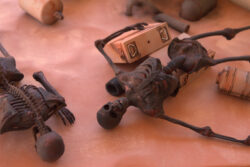 Close shot of Aunt Beru lying on some boxes.