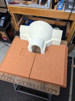 The entry hut, left and right sand plates and the steps (not pictured) have all had their base paint applied.