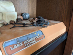 Shot of Uncle Owen and Aunt Beru on my Lars Homestead diorama with the display plaque visible.