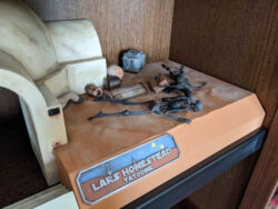 A higher shot of Uncle Owen and Aunt Beru on my Lars Homestead diorama with the display plaque visible.