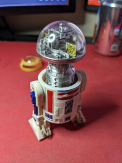 A painted prototype clear dome fitted to a 2023 R5-D4 body.